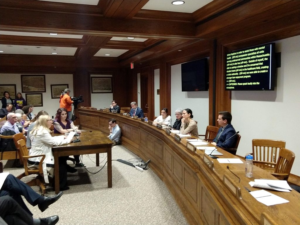 Human service workers testify at the Massachusetts State House in favor of student loan assistance.