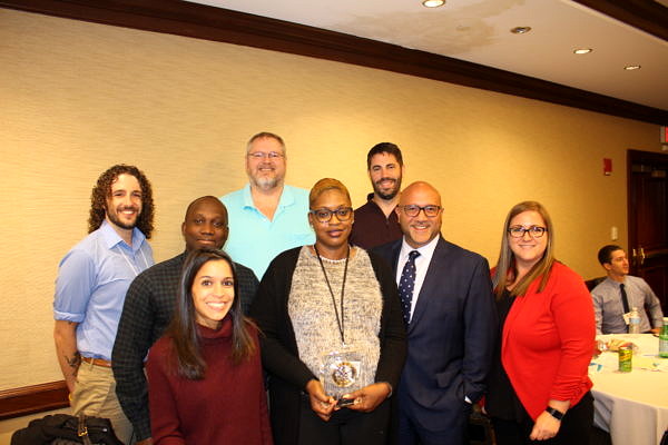 Sanchez poses with CRJ reentry staff