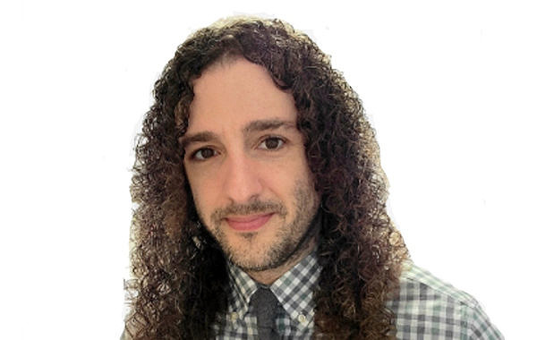 Portrait photo of Jeff Korsak from the shoulders up against a white background